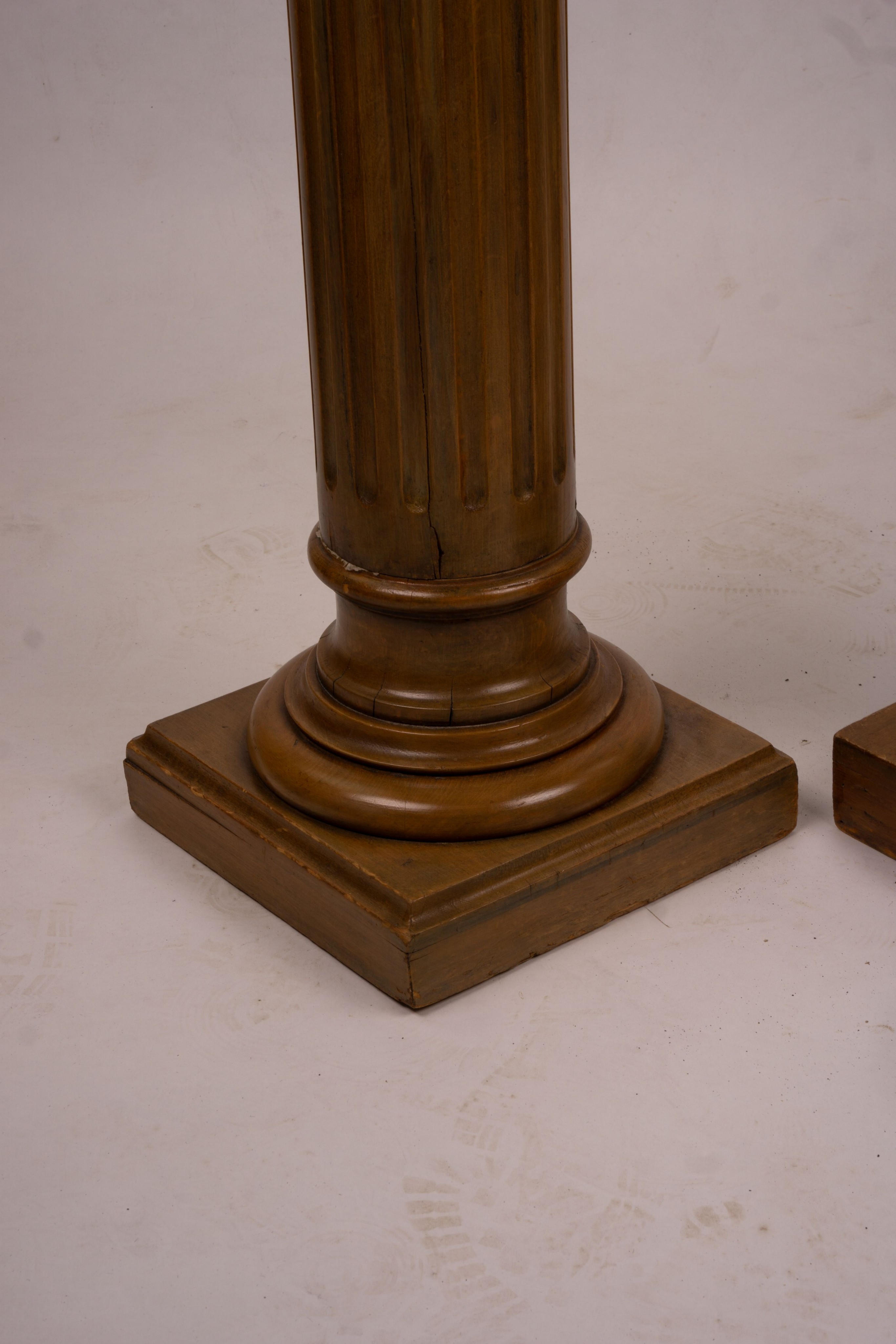 A pair of Victorian style carved beech and walnut pedestals, height 110cm